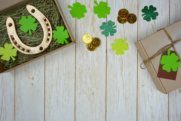 Items for St. Patrick's Day are laid out on a wooden background. 