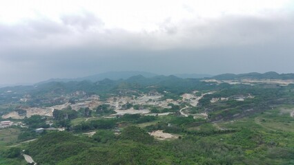 Fototapeta premium aerial view of limestone mountain as a mining site.