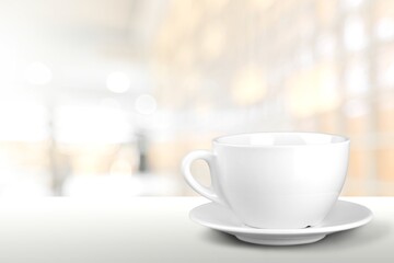 Tasty hot coffee in cup on the table