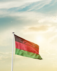 Waving Flag of Malawi with beautiful Sky.