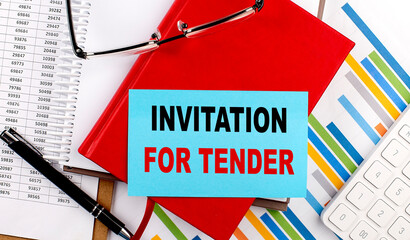 INVITATION FOR TENDER text on sticky on red notebook on chart background