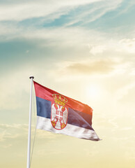 Waving Flag of Serbia with beautiful Sky.