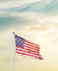Waving Flag of United States with beautiful Sky.
