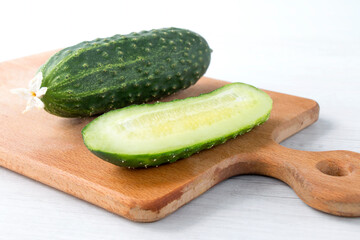 sliced cucumbers on a kitchen board, close-up