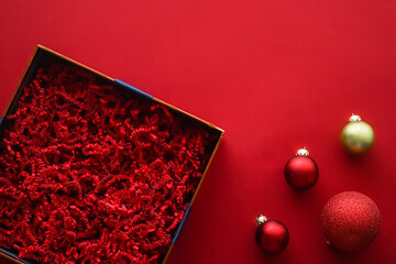 Christmas holiday gift and beauty box subscription package mockup for luxury xmas present or product, empty open gift box flat lay on red background as online shopping delivery, flatlay copyspace