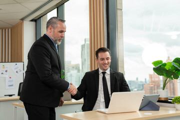 Leader or businessman sends documents male colleague in the creative office.