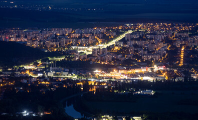 Housing estate at night with streetlights