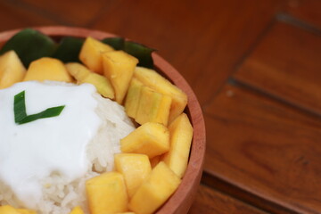 a close up of mango sticky rice