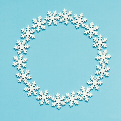 round frame made by snowflakes