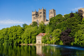 Durham England: 2022-06-07: Durham Cathedral exterior during sunny summer day. View from river wear...