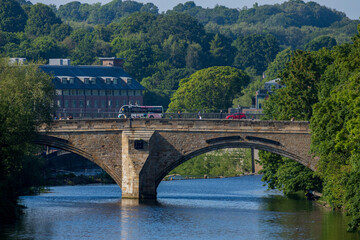 Fototapeta na wymiar Durham England: 2022-06-07: Bridge over the River Wear in Durham city exterior during sunny summer day