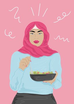 Woman wearing hijab eating food