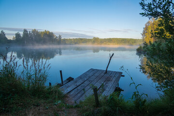 wooden bridge over lake