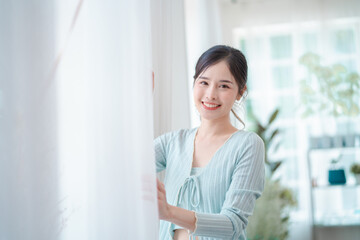 portrait of beautiful young asian woman, Closeup face of a pretty asian model looking at window.	
