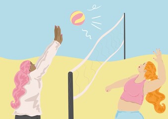 girls playing volleyball on the beach