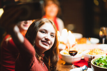 happy family with party taking selfie by smartphone at home christmas dinner
