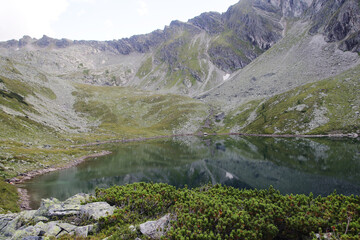 Naklejka na ściany i meble Palfner lake in Gastein valley, the view from Graukogel, Austria
