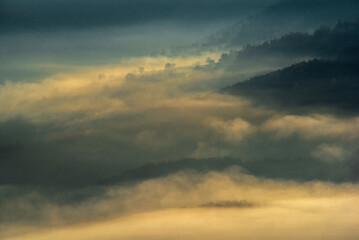 Fototapeta na wymiar Morning mist in the mountain. Autumn scene.