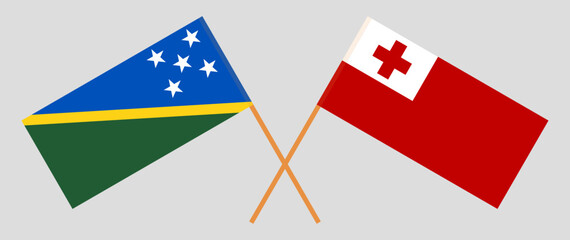 Crossed flags of Solomon Islands and Tonga. Official colors. Correct proportion