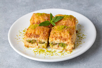 Traditional turkish new dessert cold milky baklava with pistachio (Turkish name; soguk baklava)