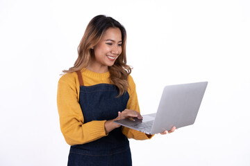 Asian woman entrepreneur or shop owner holding a  laptop computer with an excited face. isolate on a white background.