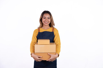 Young Asian woman startup small business freelance holding parcel box and sitting on isolated over the bright white color background, SME Online marketing packing box delivery and isolated concept