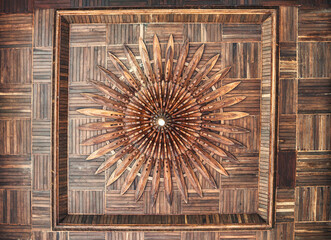 Luxury ancient ceiling design with craft wooden timber and light bulb in hall of church