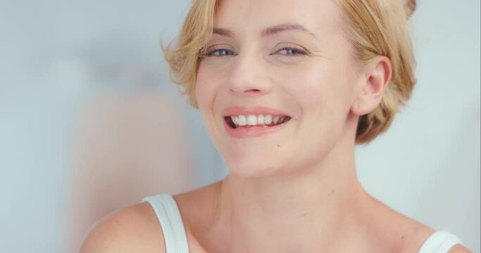 Healthy skin all day every day. Beauty, skincare and face of a woman happy, confident and healthy with cosmetics, make up and dermatology portrait. Smile of a model at home with a glow.