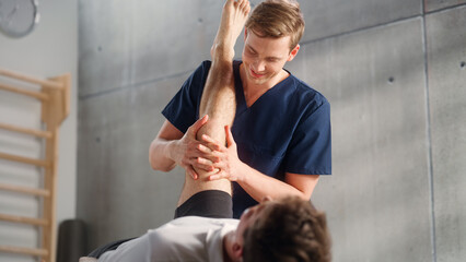 Close Up of a Sportsman Patient Undergoing Physical Therapy to Recover from Surgery and Increase Mobility. Physiotherapist Works on Specific Muscle Groups or Joints to Rehabilitate from Injury.