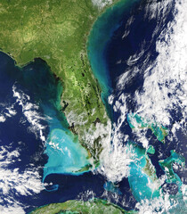 Satellite view of an hurricane hitting on  Florida. View of Cuba, The Bahamas and Caribbean from...