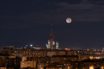 Madrid skyline at night with moon