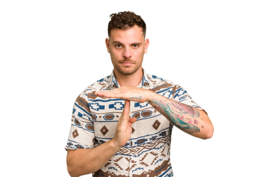 Young caucasian handsome man isolated showing a timeout gesture.