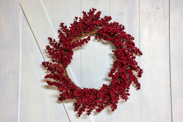 Red Berry Grapevine Wreath on Barn Door