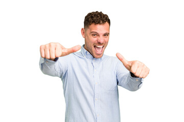 Young caucasian handsome man isolated raising both thumbs up, smiling and confident.