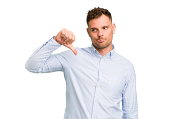 Young caucasian handsome man isolated showing a dislike gesture, thumbs down. Disagreement concept.