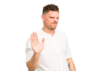 Young caucasian handsome man isolated rejecting someone showing a gesture of disgust.
