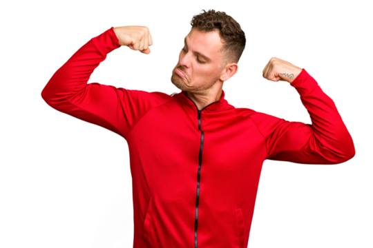 Young caucasian handsome man isolated showing strength gesture with arms, symbol of feminine power