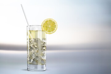 Tasty sweet drink in glass with ice