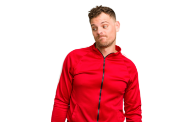 Young caucasian handsome man isolated shrugs shoulders and open eyes confused.