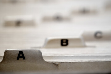 Business cards indexed and organized for communications and contacts or leads for sales to clients