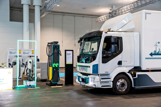 Volvo FL Electric truck at a EV charging station at the Hannover IAA Transportation Motor Show. Germany - September 20, 2022