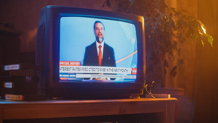 Close Up Footage of a Dated TV Set Screen with Breaking News Report. Handsome Middle Aged Anchorman...
