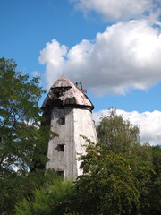 Old weathered and defunct wind mill in east Germany - 550050793