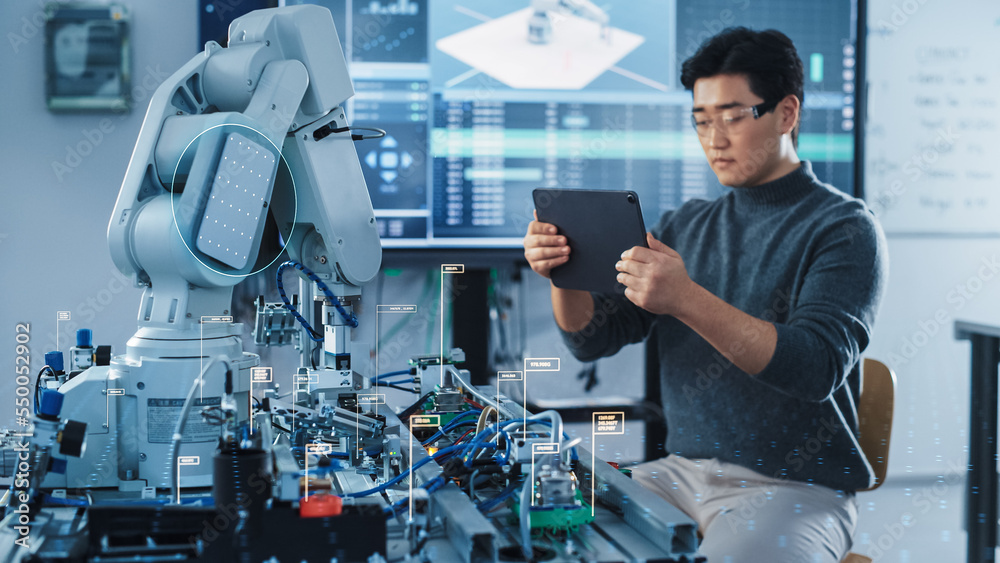 Poster Computer Science Development Engineer Using Tablet Computer to Program and Operate a Robot Arm. VFX Augmented Reality Icons Demonstrate Innovative Industry 4.0 Concept.