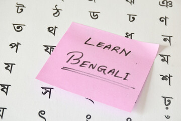 Learn Bengali memo on Bengali language alphabets. Close up, selective focus. 