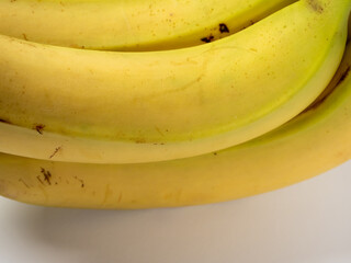 Banana on a white background. Ripe bananas on a light background.
