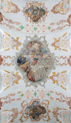 LUZERN, SWITZERLAND - JUNY 24, 2022: The ceiling fresco of Gloroy of St. Francis Xavier and St. Carlo Borromeo before Jesuit church by Giuseppe Antonio and Giovanni Antonio Torricelli from 17. cent.