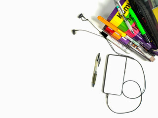 Flat lay,background mockup. the workspace in the background of the desk is white from the top view. layout space with mobile phones, books, pencils, stationery on a white desk background.