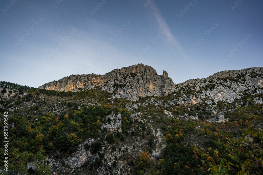 Poster scenic view of the hiking area sentier blanc-martel with colorful trees in autumn