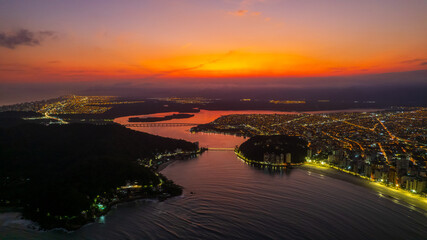 Drone image of a coastal town sunset